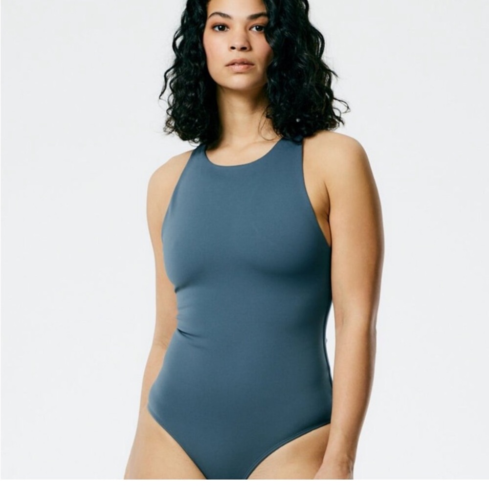 Tibi Nitro Cycling bodysuit in blue gray color. Racerback.